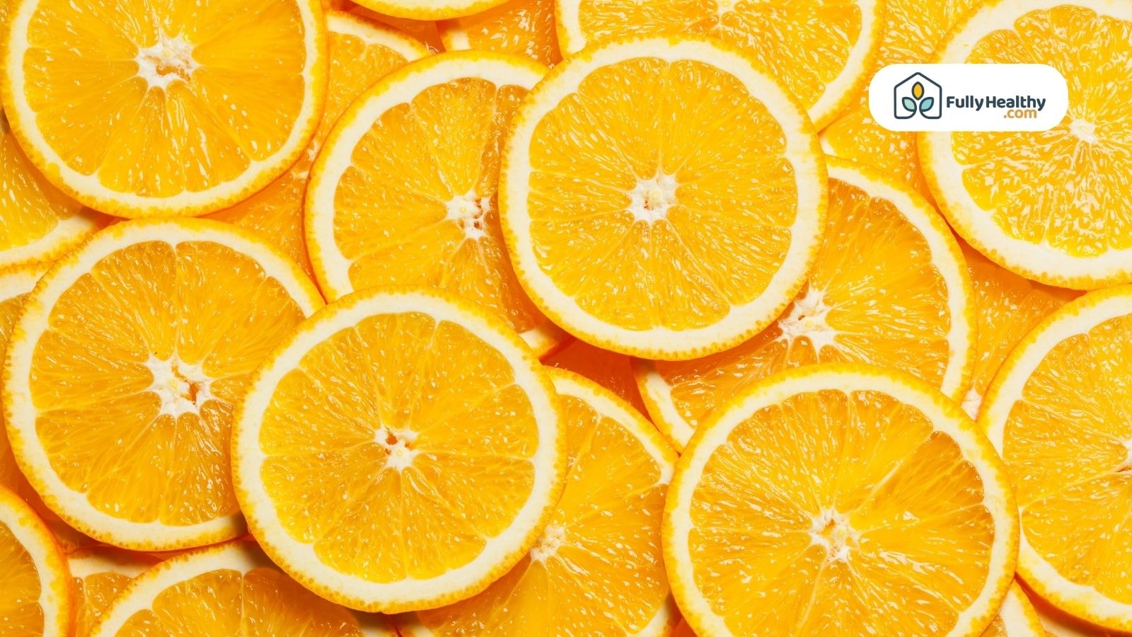 Bright orange slices arranged closely in a full-frame pattern