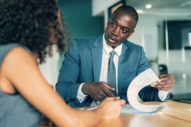 Attorney advising client on self-employment and immigration status