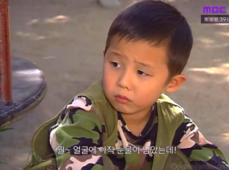 This contains an image of G Dragon  when he was a child