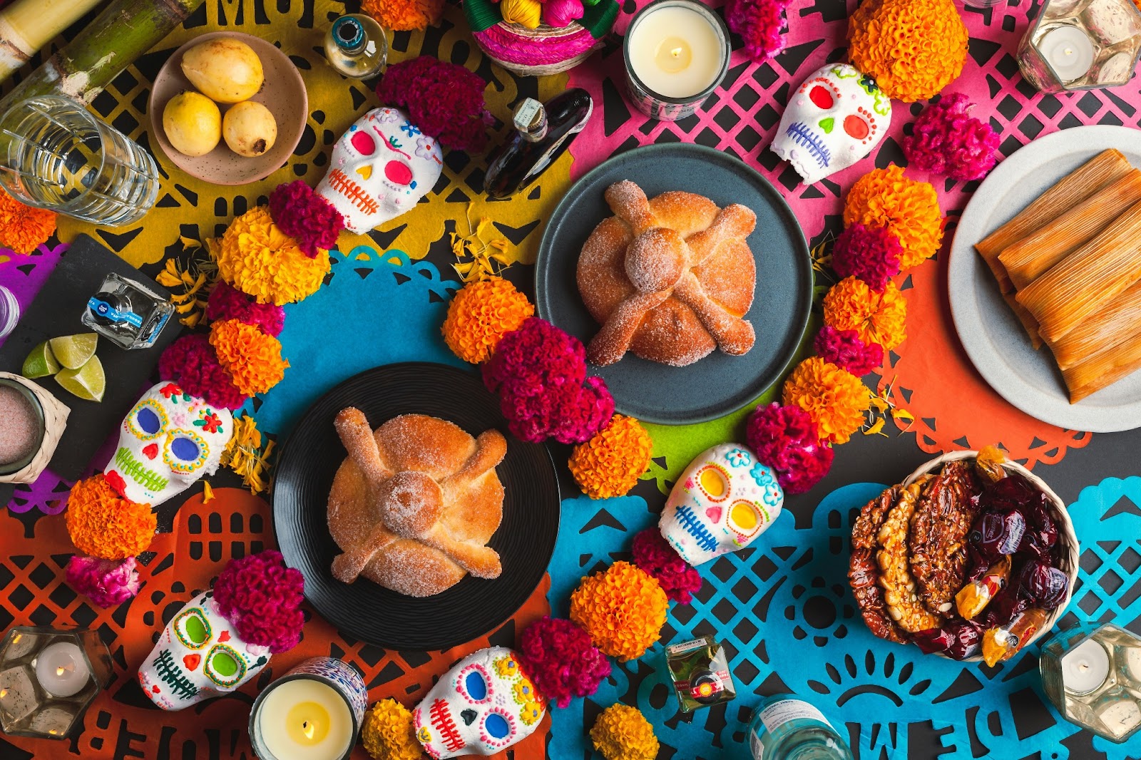 A table set with love and tradition—a tribute to ancestors that touches the soul for the Dia de Muertos. 