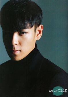 This contain an image of T.O.P - BigBang on black