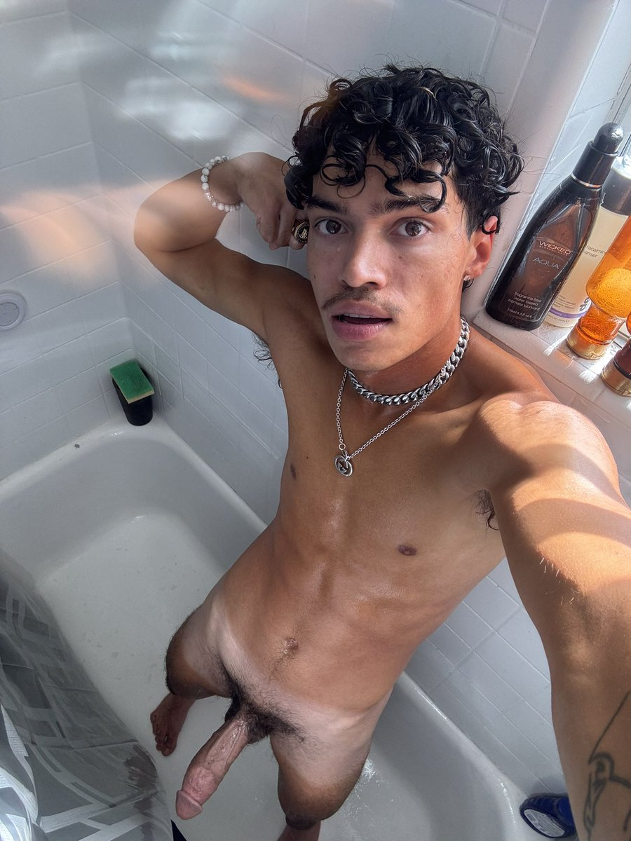 gay xxx onlyfans creator Alex Myers naked flexing in the shower showing off his hot muscled chest and big thick cut 8 inch dick