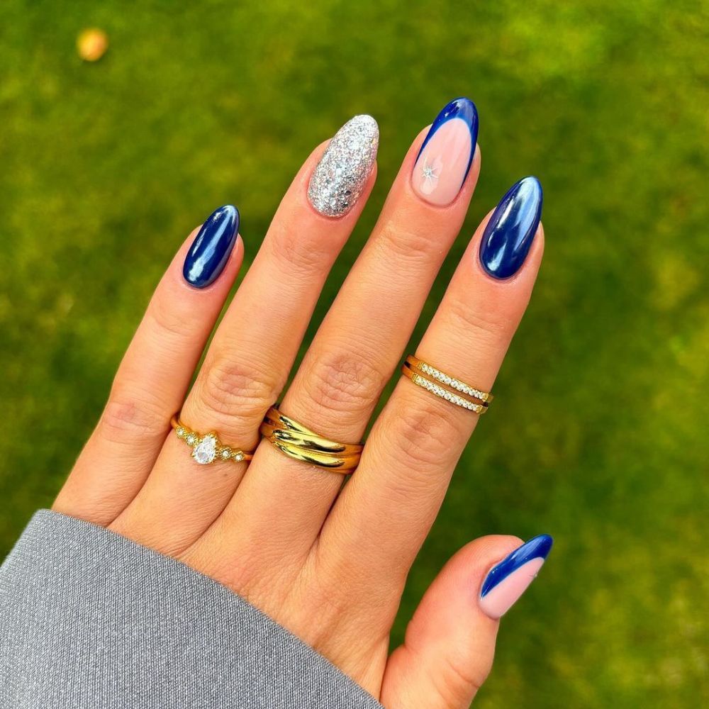 Close up of hands with blue winter nails having Grey and Blue Combo 