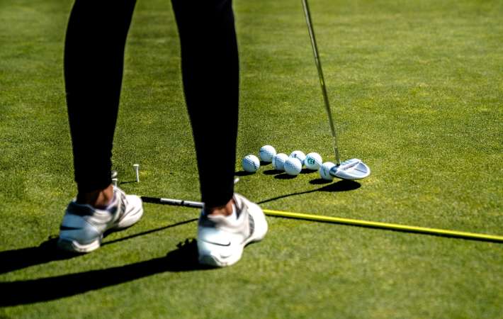 Playing a round of mini golf is a fun team building activity in San Francisco.