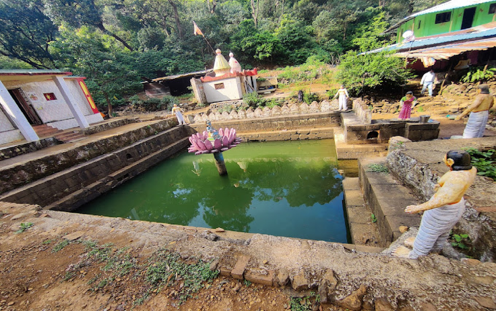 Tranquil Hanuman Lake surrounded by greenery, a key destination on the Bhimashankar Trek