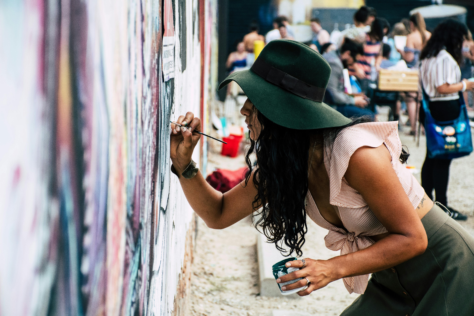 woman painting the wall