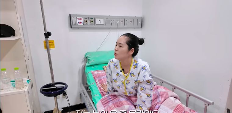 This contains an image of Han ga in at the hospital