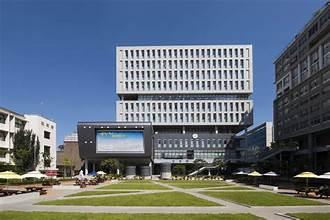 A large building with a large screen

AI-generated content may be incorrect.