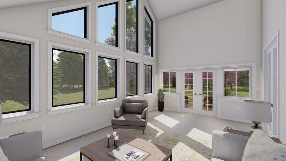 A white french door extends the sunroom onto the rear porch.