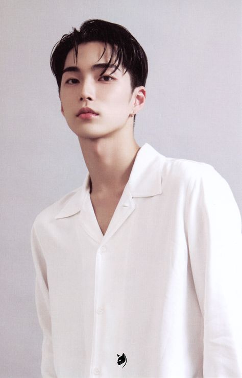 A picture of SEUNGHAN RIIZE wearing a white long sleeve shirt 