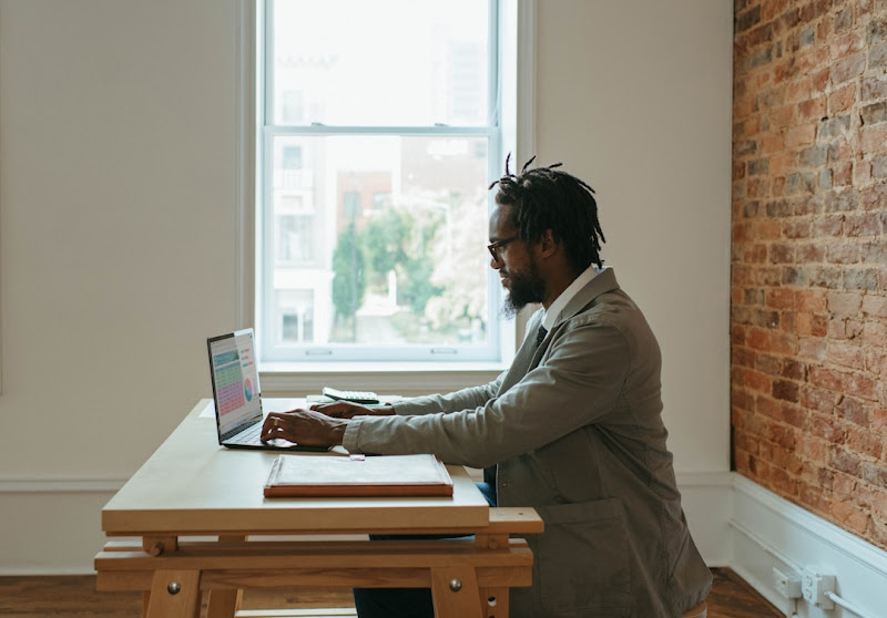 A businessman securely transmitting sensitive information using a cloud fax service