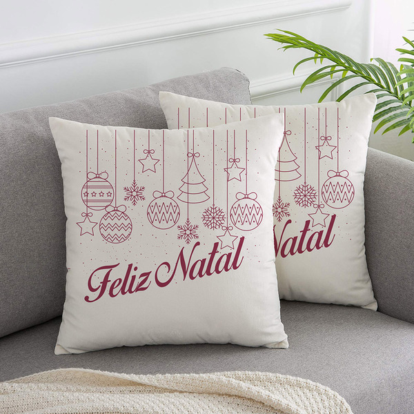 Capa para almofada natalino escrito “Feliz Natal”.