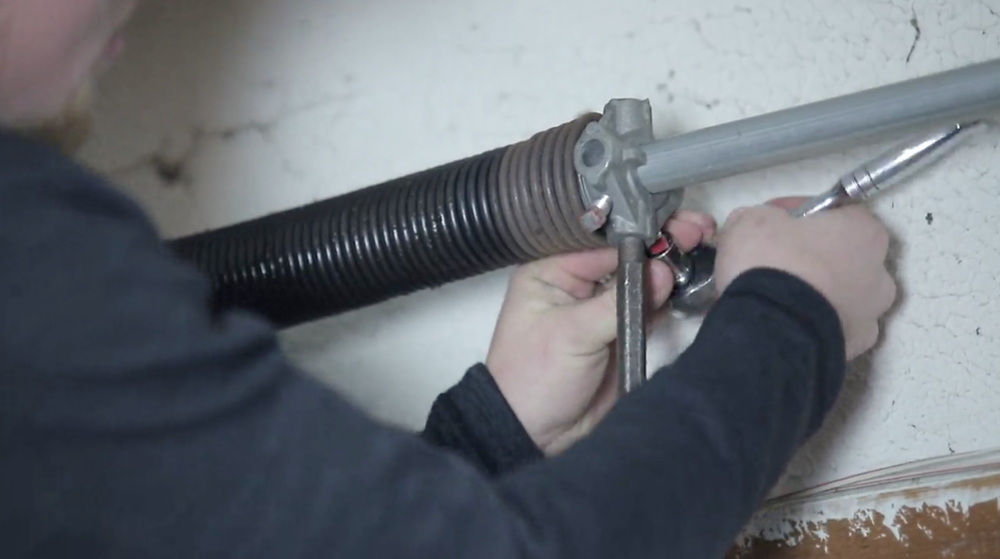 how to replace garage door spring