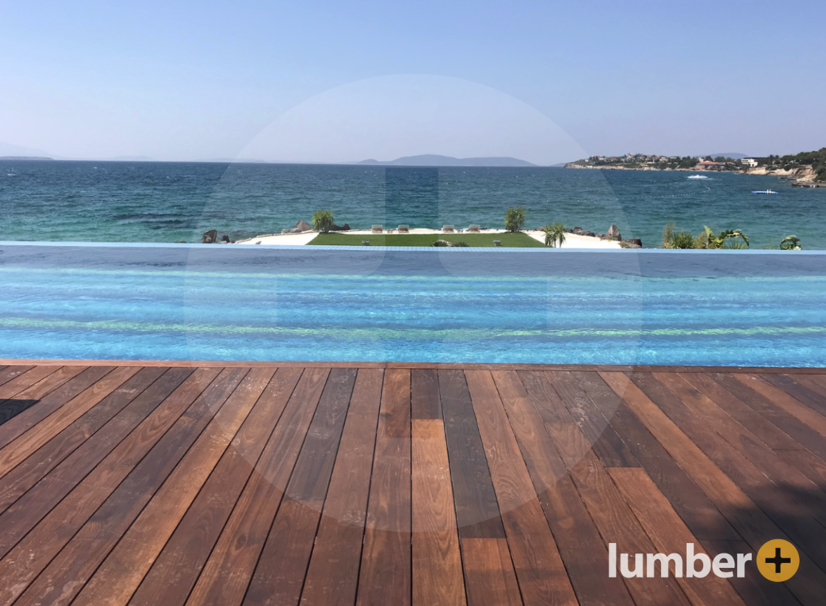 an image a hardwood deck on the coast near a beach