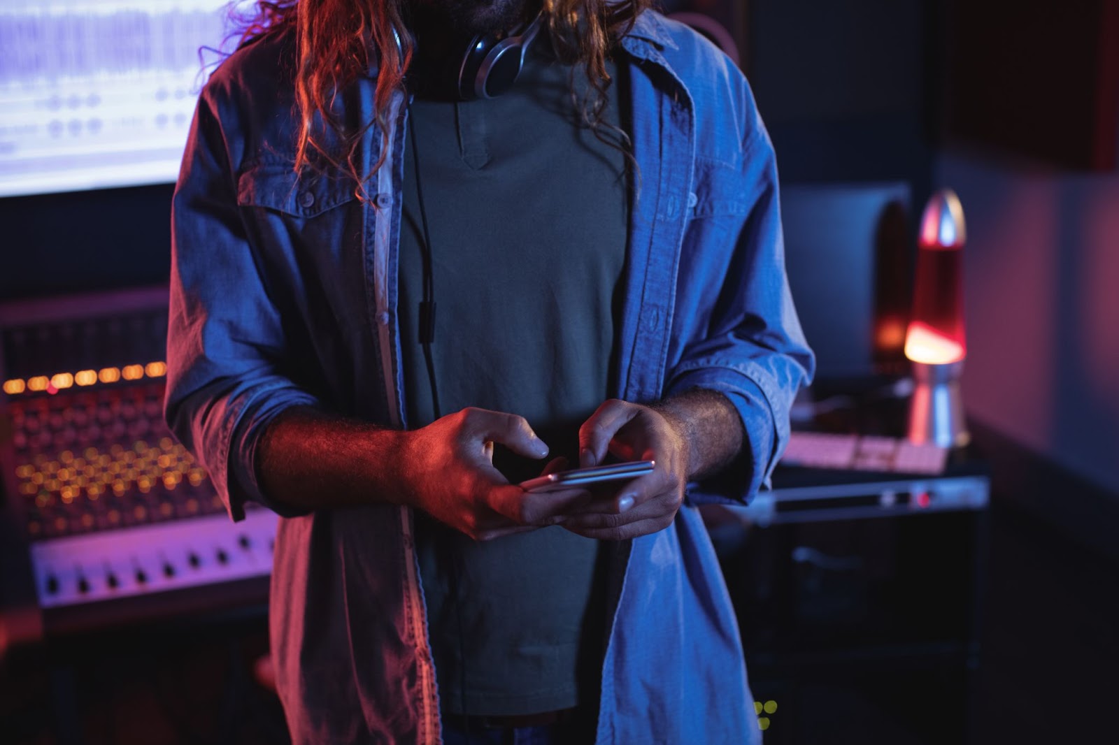 a venue manager checks details on a mobile device