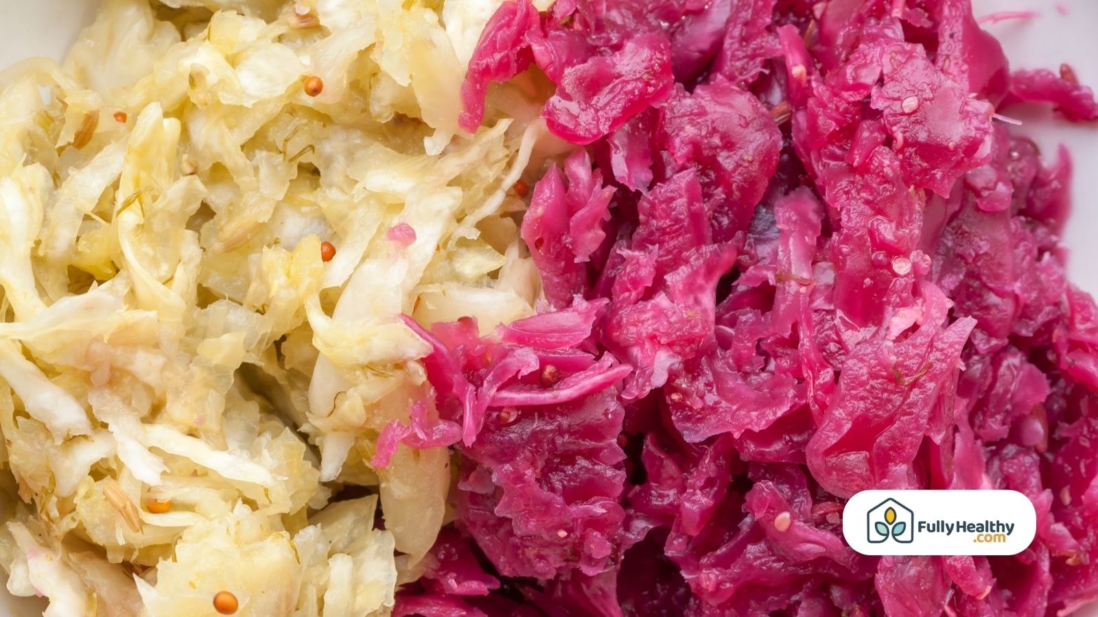 Mixed red and white sauerkraut with visible mustard seeds