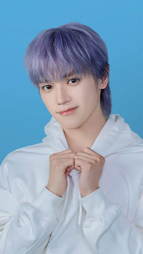 This contains an image of NCT Taeyong