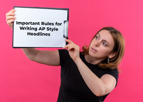 A woman holding up a board saying "Important Rules for Writing AP Style Headlines"