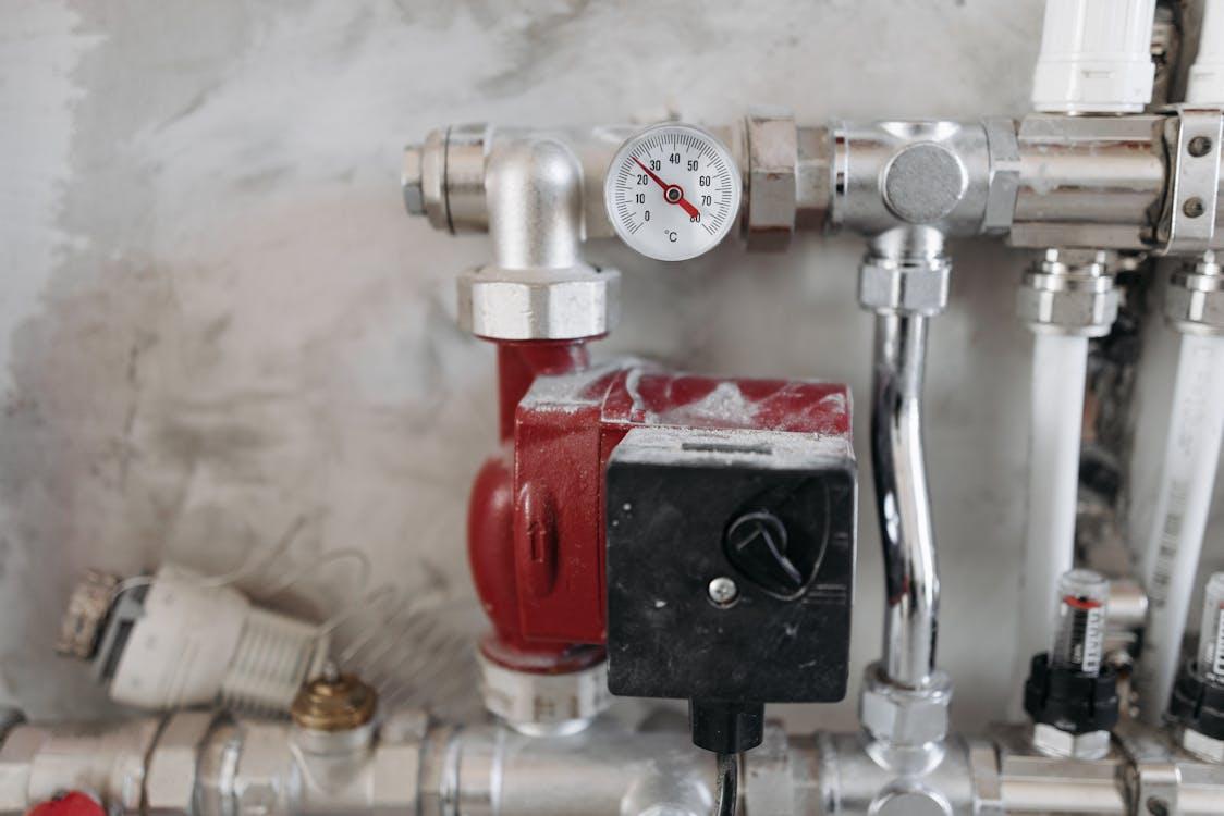 Free Steel Pipes with Pressure Gauge Stock Photo