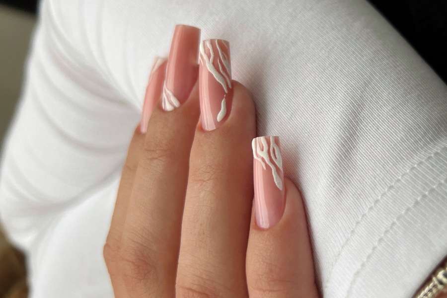 3D texture tips introduce depth and unique details to French nail tip design.