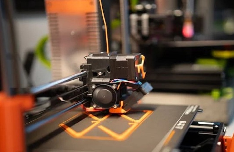 3D printer printing a small object.





