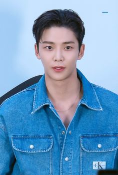 This contains an image of Rowoon 
Calvin Klein on blue jean jacket