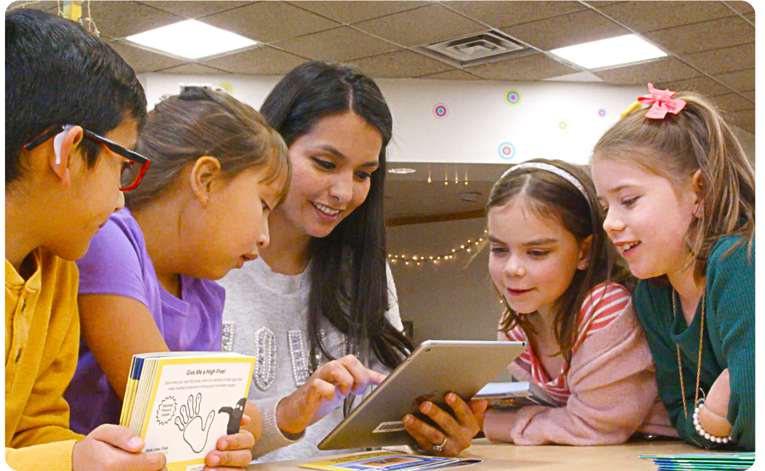 Photo of students and teachers using high-quality instructional materials.