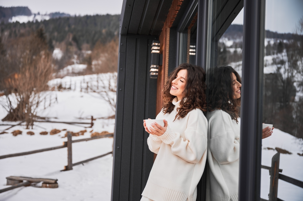 Woman wearing off-slope apparel at a mountain resort