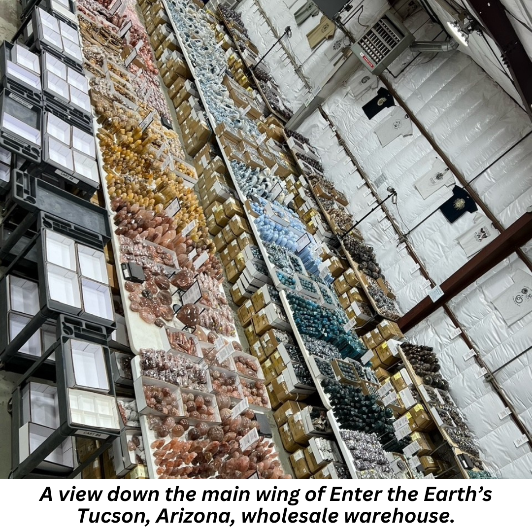 A view down the main wing of Enter the Earth’s Tucson, Arizona, wholesale warehouse.