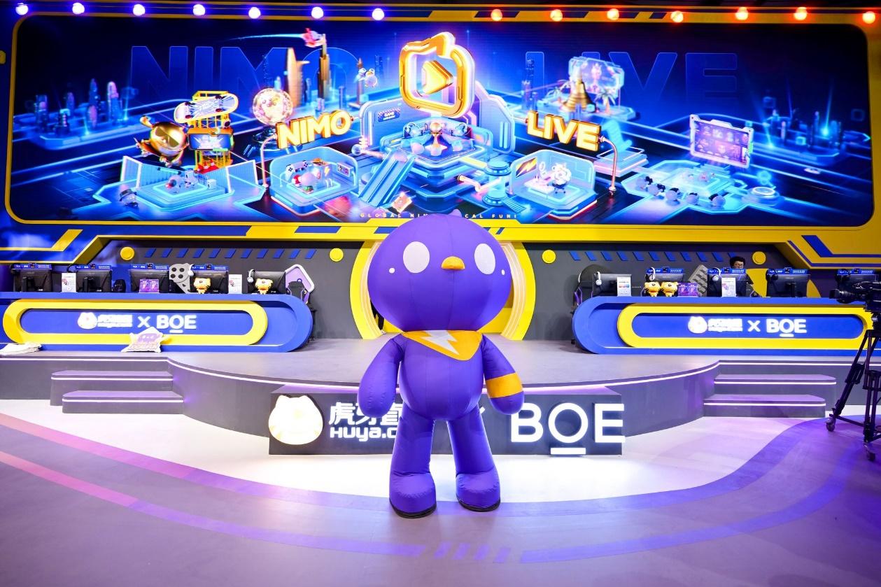 A purple toy on a stage

Description automatically generated