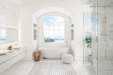 winter remodeling projects to tackle now for a spring ready home tile floor bathroom remodel with freestanding tub and glass shower doors custom built michigan