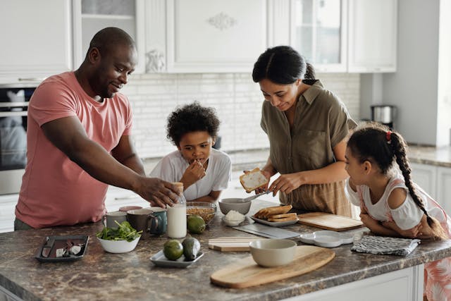 A family making a meal together.