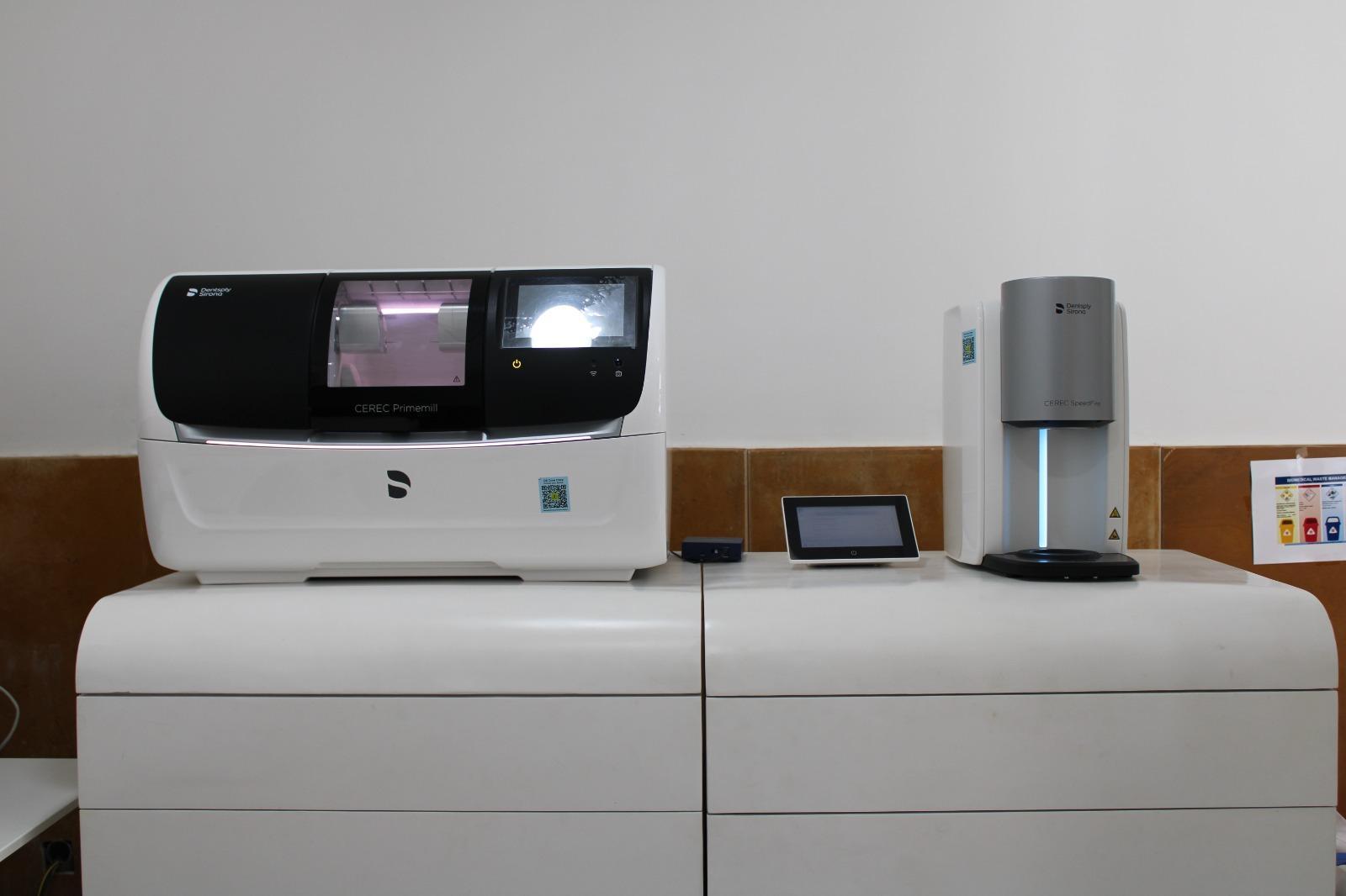 A white cabinet with several devices Description automatically generated with medium confidence