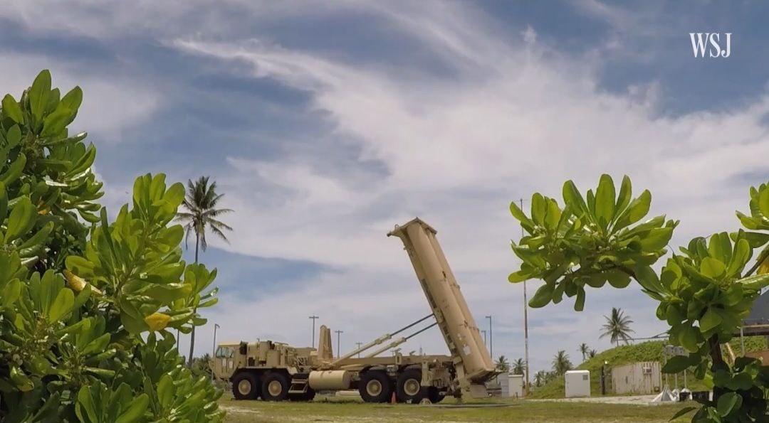 A large military vehicle with a missile attached to it

AI-generated content may be incorrect.