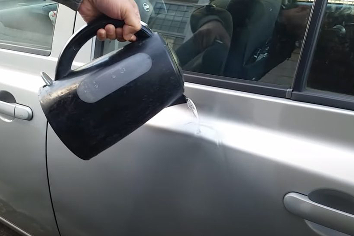 Boiling water technique to repair dent