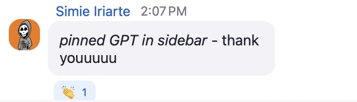 A screenshot of a chat message from Simie Iriarte, timestamped at 2:07 PM. The message reads: “pinned GPT in sidebar – thank youuuu” with italic formatting applied to the phrase “pinned GPT in sidebar.” Below the message is a clapping hands emoji reaction with the number 1 next to it, indicating one person reacted. Simie’s profile picture is a cartoon-style avatar featuring a skeleton wearing a hooded sweatshirt on an orange background.