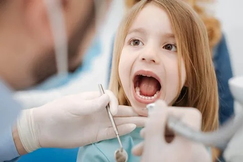 Fluoride treatment for kids at Pinnacle Pediatric Dentistry Houston, providing gentle and effective preventive dental care to protect children's teeth from cavities and decay.