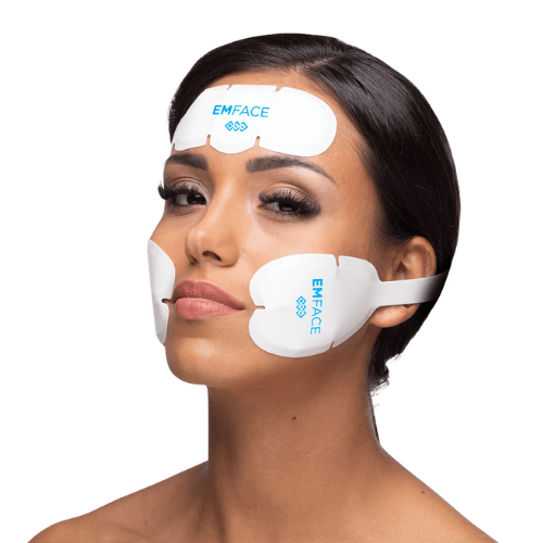 in this image the girl is present with emface patches used to tighten the skin. 