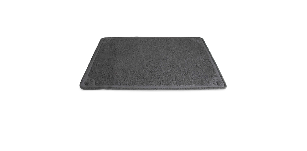 Dark gray textured mat with paw print designs in the corners, used for trapping litter or food debris