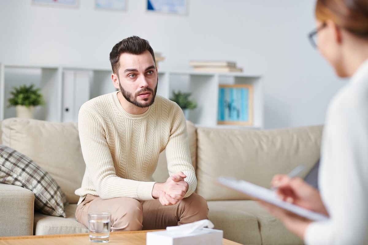 Man talking to a counselor