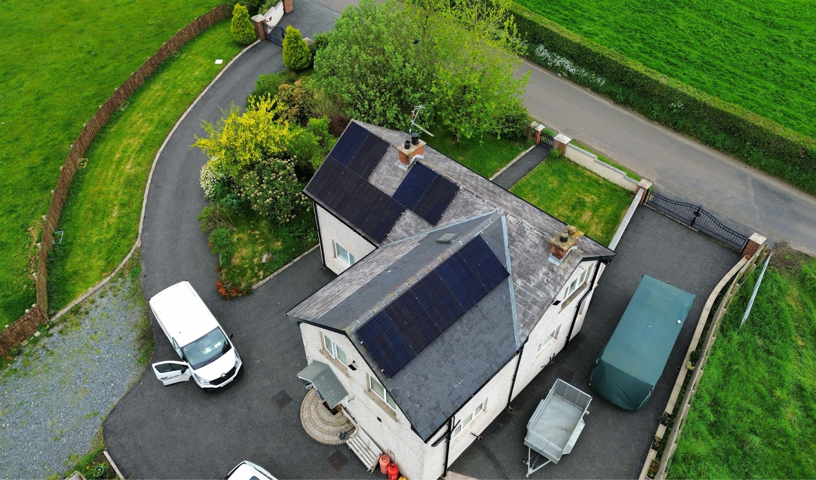 Northern Ireland residential property with solar panels on roof - drone picture