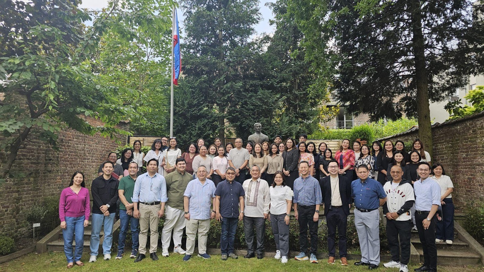 A group of people posing for a photoAI-generated content may be incorrect.