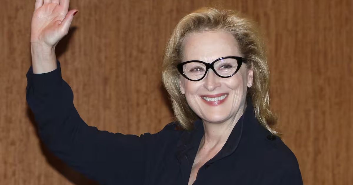 Meryl Streep expresses her views on feminism, showcasing her signature Pulled-Back Lob hairstyle in the image.