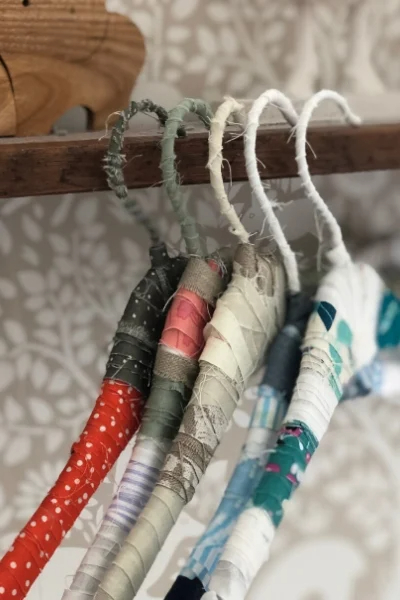 clothing hangers wrapped with scraps of fabric