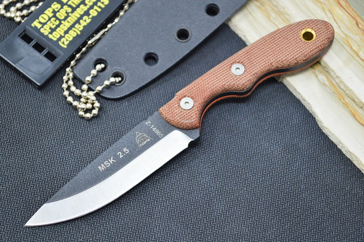 An image showing the compact and lightweight Tops Mini Scandi 2.5 fixed blade. It features a Micarta handle, a drop point blade, and a black Kydex sheath with chain for neck carrying.