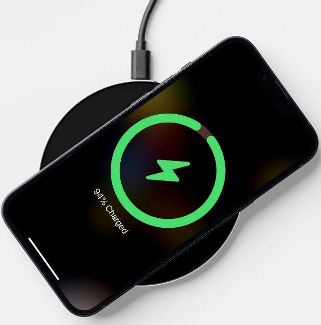 A phone charging on a wireless charger

AI-generated content may be incorrect.