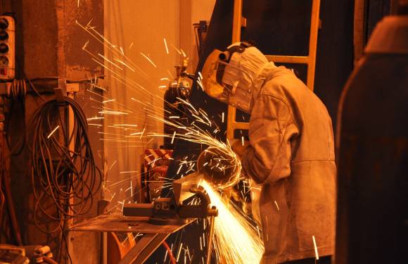 welder with sparks flying