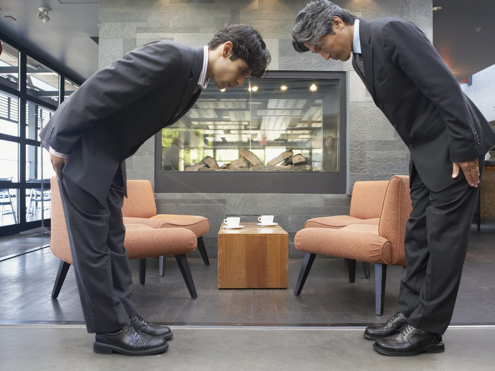Bowing to greet Japanese business partners
