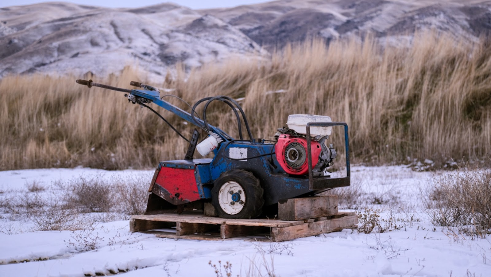 A photo of an old, blue Barreto tiller to celebrate their 40th Anniversary