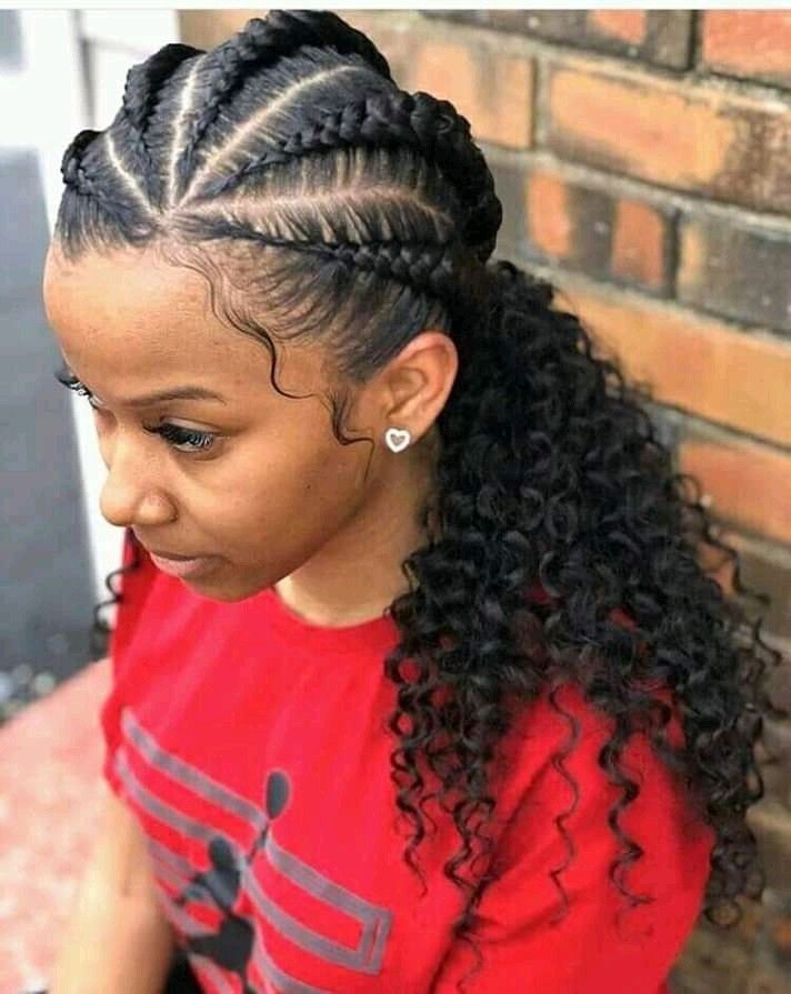 a lady rocking five cornrows with curly ends as the latest hair braids